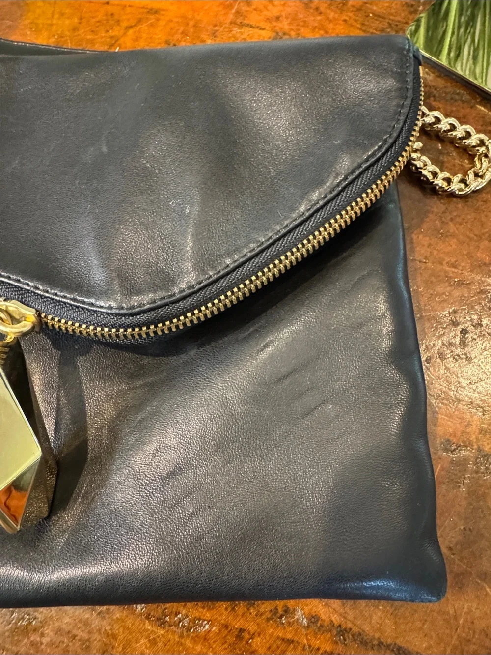 henri bendel Black Leather Fold-Over Clutch with Gold Chain